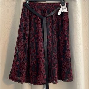 Skirt. Size M.  Red & black. By JoeBenBasset. 24”. Polyester. Tags on.